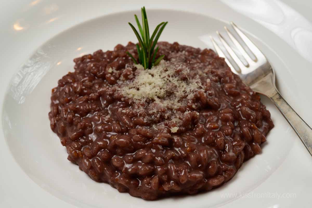 A dish of risotto al brasato, one of the most typical food of the Piedmont region in Italy